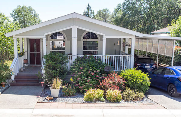 gray mobile home with white picket fence placerville california diamond springs